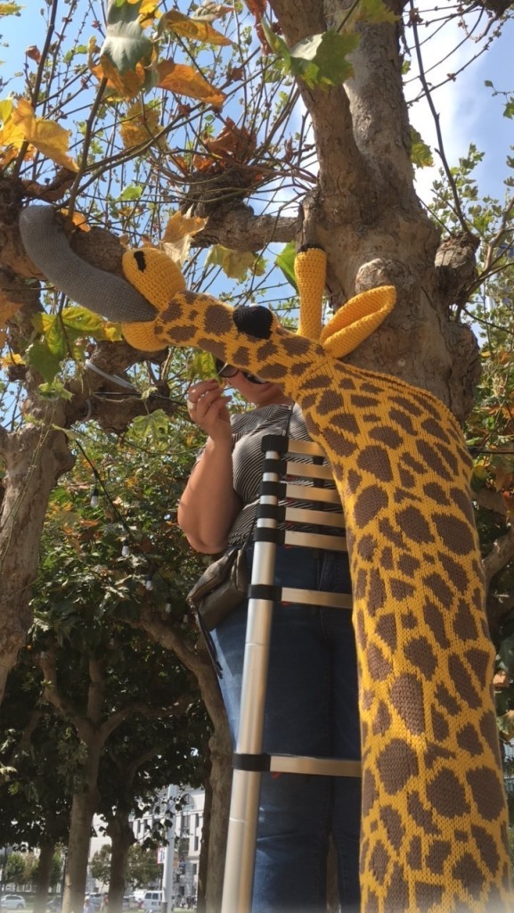 Knitting the Commons San Francisco Giraffe Yarn bomb by Knits for Life